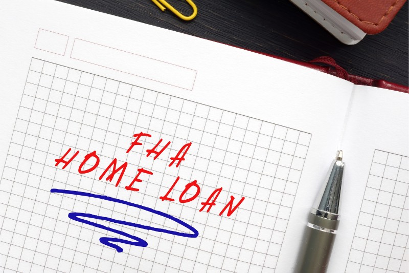 Notebook paper that says "FHA home loan"