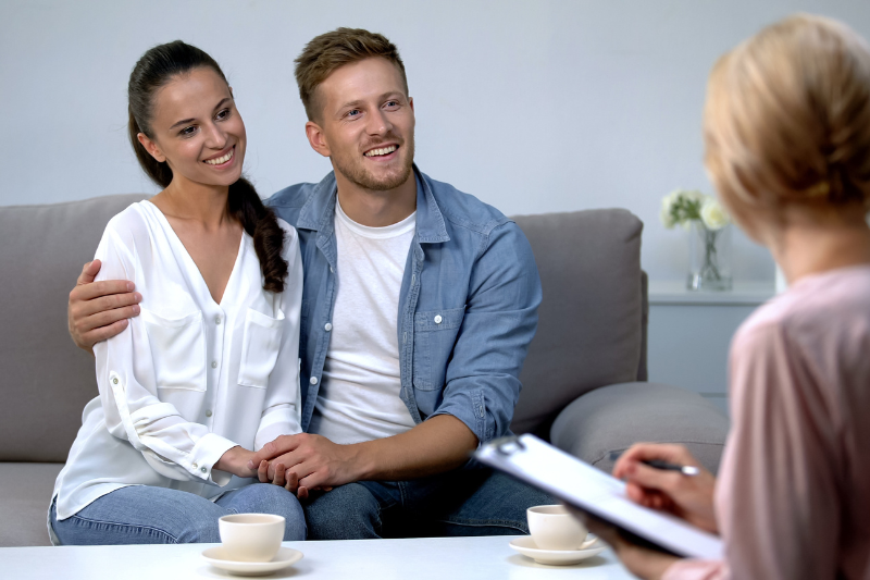Couple getting advice from mortgage professional