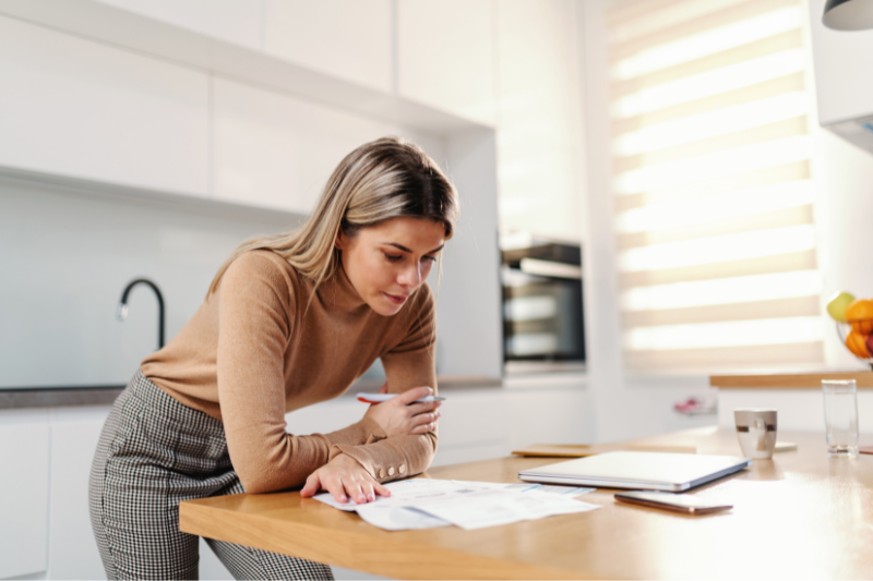 Woman Reviewing Documents